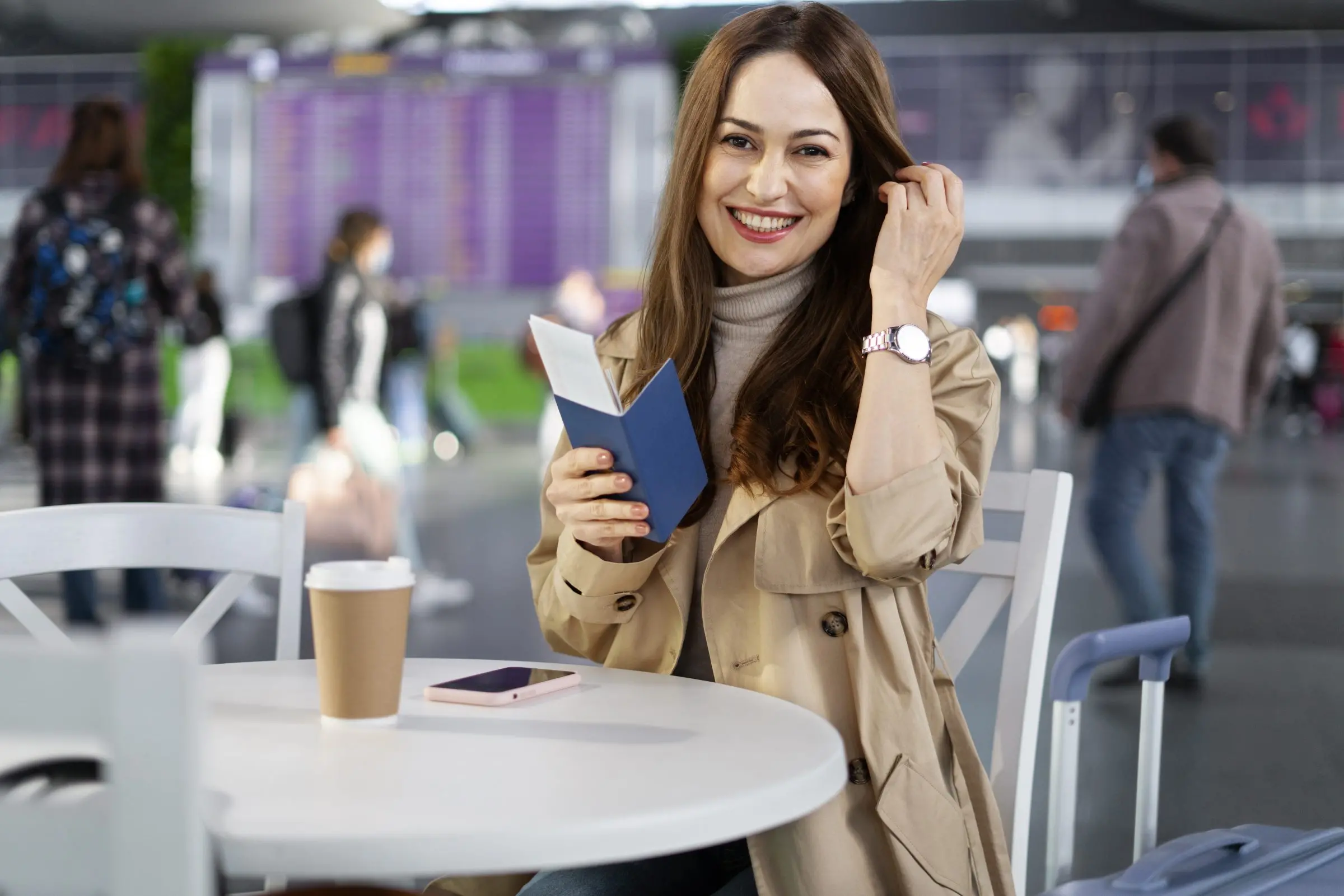 medium shot smiley woman with passport